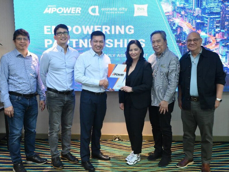 REVITALIZED PARTNERSHIP.  (From left) MPower head of commercial operations Ray Fabros, MPower senior assistant vice president and retail sales head Eddie John Adug, MPower first vice president and head Redel M. Domingo, Novotel and ibis Styles Manila cluster general manager Maria Manlulu-Garcia, ACI Inc. senior vice president of operations Antonio Mardo, and ACI Inc. senior vice president of business development John Castelo./ Photo from Meralco