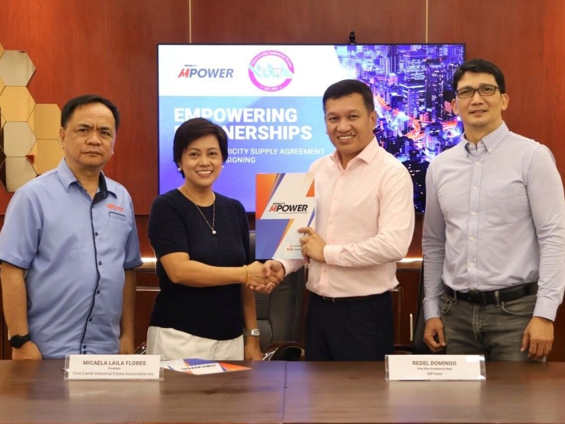 MPower and First Cavite Industrial Estate Association Inc. (FCIE) have partnered to consolidate the energy needs of the latter’s multiple facilities to enroll under the Retail Aggregation Program. In photo (L-R) are FCIEAI vice president Aurelio Masangkay, FCIEAI president Micaela Laila Flores, MPower first vice president & head Redel M. Domingo, and MPower senior asst.  vice president & retail sales head Eddie John V. Adug. | Contributed photo