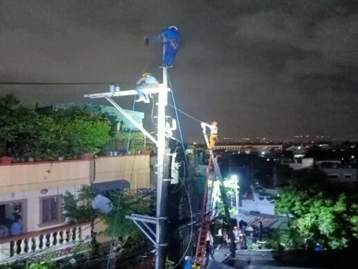 Meralco men at work/ Contributed photo