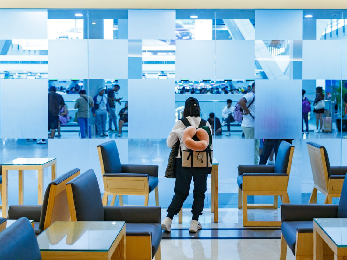 A traveler waits for her flight inside NAIA's newly refurbished lounge for overseas Filipino workers in Terminal 3./Contributed photo