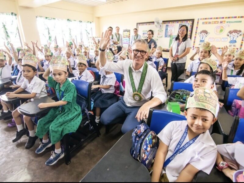 The company's nutrition education program now reaches 12 million students in 26,000 public schools across nine regions.| Contributed photo