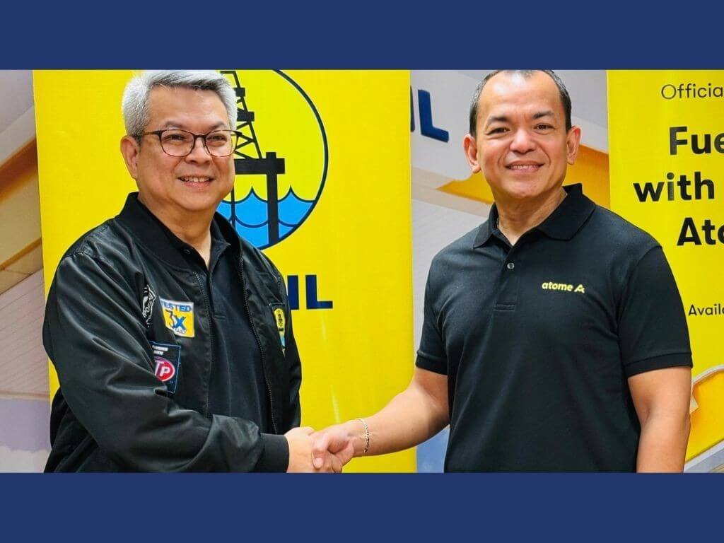 Jayvee dela Fuente, vice president for corporate and consumer marketing, Seaoil Philippines and Christian Quiros, president and general manager of Atome Philippines at the MOU signing. | Contributed photo