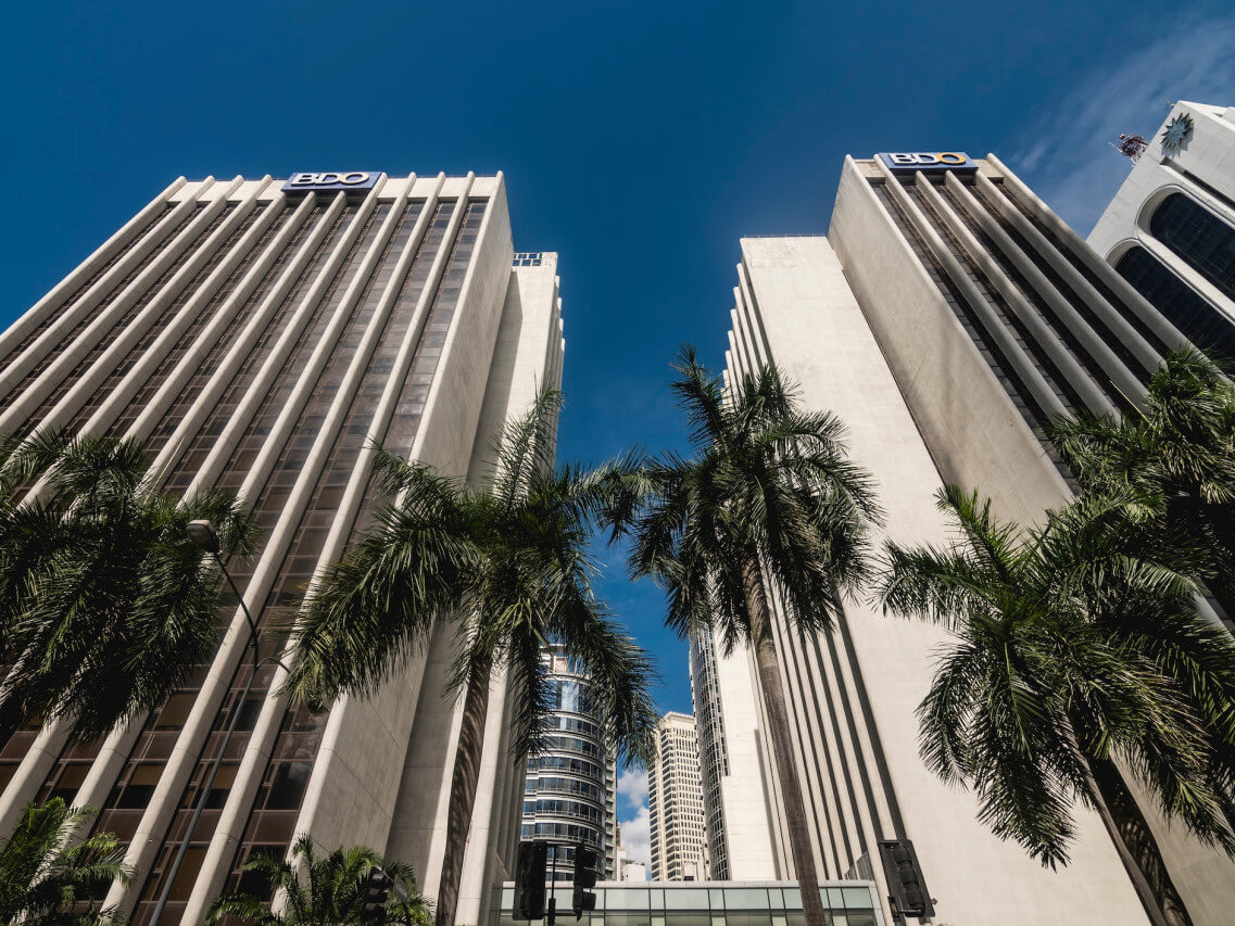 BDO's old headquarters, the former PCI Bank north and south towers, that were demolished in 2022./Adobe Stock