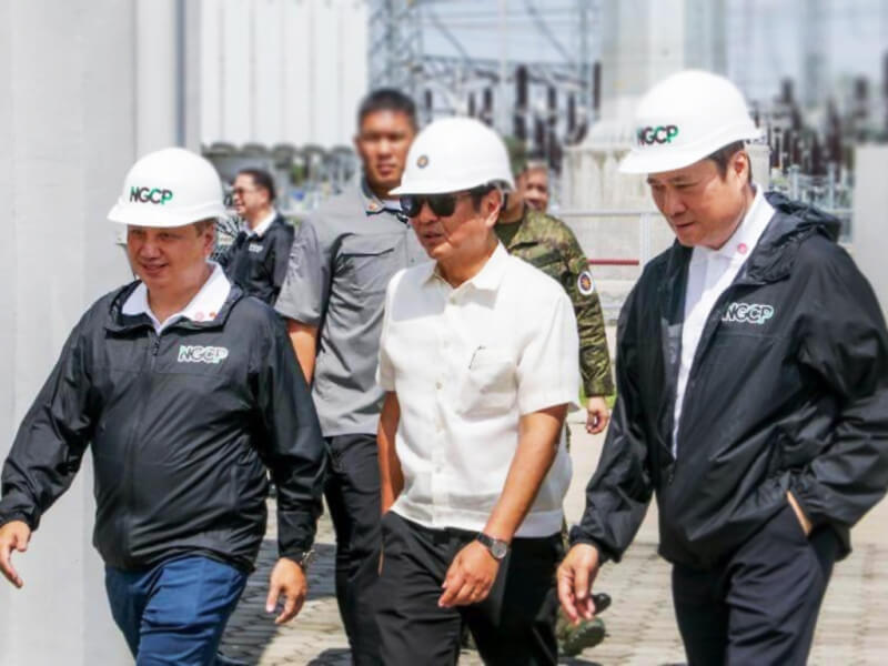 NGCP president Anthony Almeda, President Marcos, and NGCP vice chair Henry Sy Jr. inspect the grid operator's new transmission facility in Bataan (Photo courtesy of NGCP).