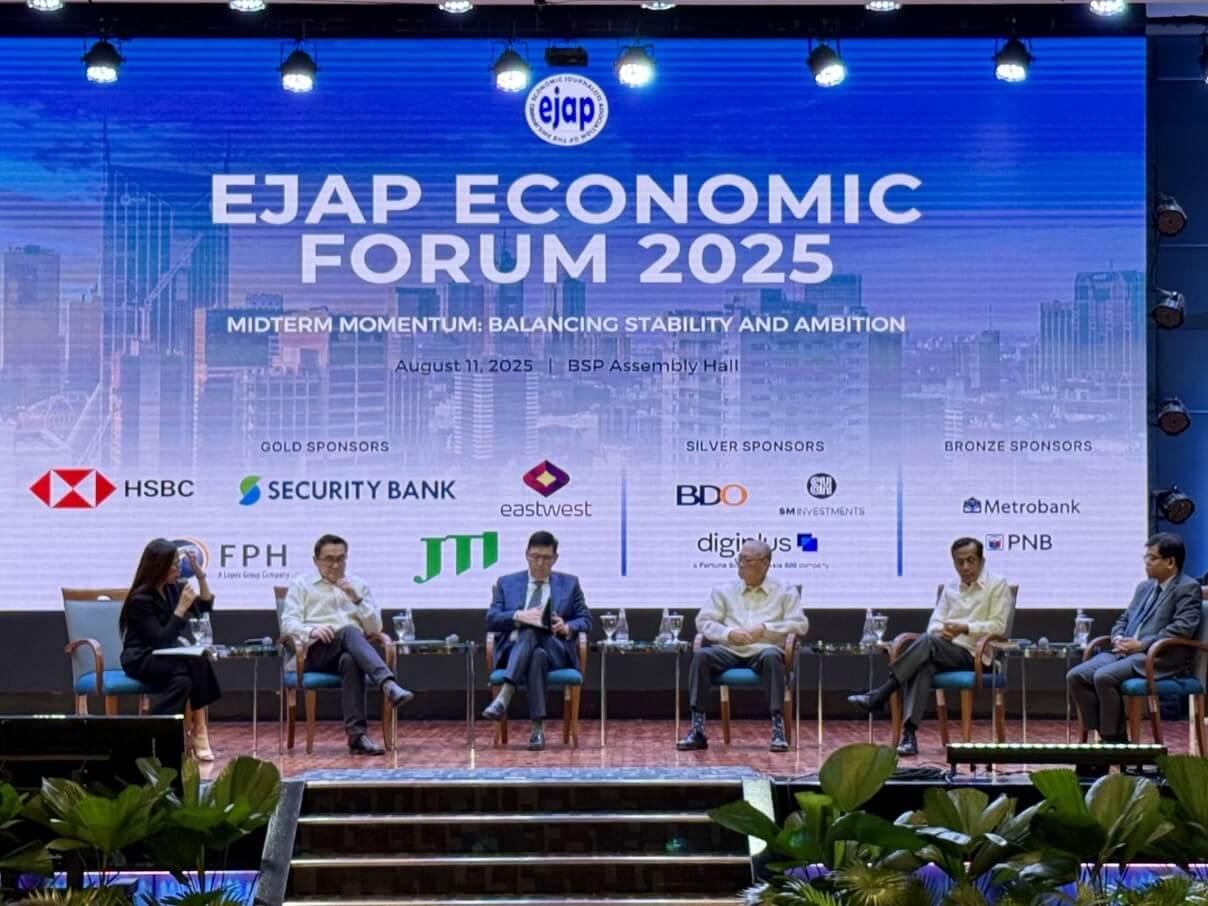 Reuters' Manila bureau chief Karen Lema moderates the panel discussion composed of Sec. Frederick Go, Sec. Ralph Recto, Governor Eli Remolona Jr., Sec. Arsenio Balisacan, and Assistant Sec. Romeo Balanquit./Photo by Daxim L. Lucas