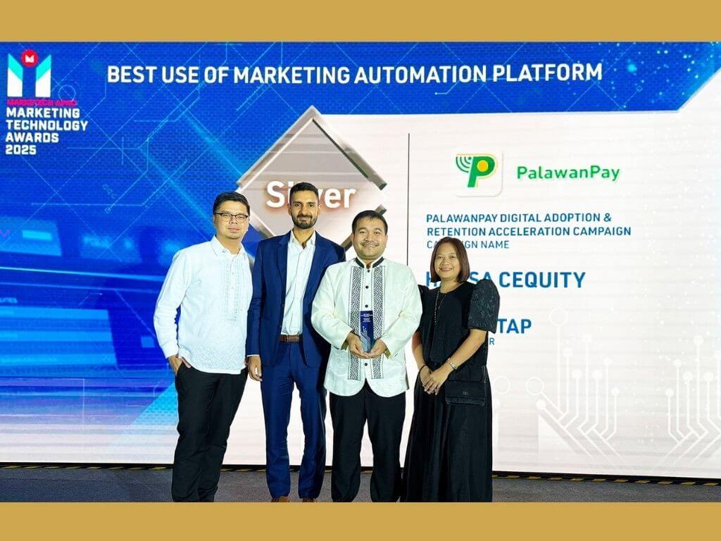 (From left): Palawan Group executives Jeff Dimaano, head of Integrated Marketing Communication; Gelain Ramos, head of Customer Relations Management; and Bernard Kaibigan, chief marketing officer, with Siddharth Swamy, regional director of Hansa Marketing Services, celebrate the company’s global recognition./Contributed Photo