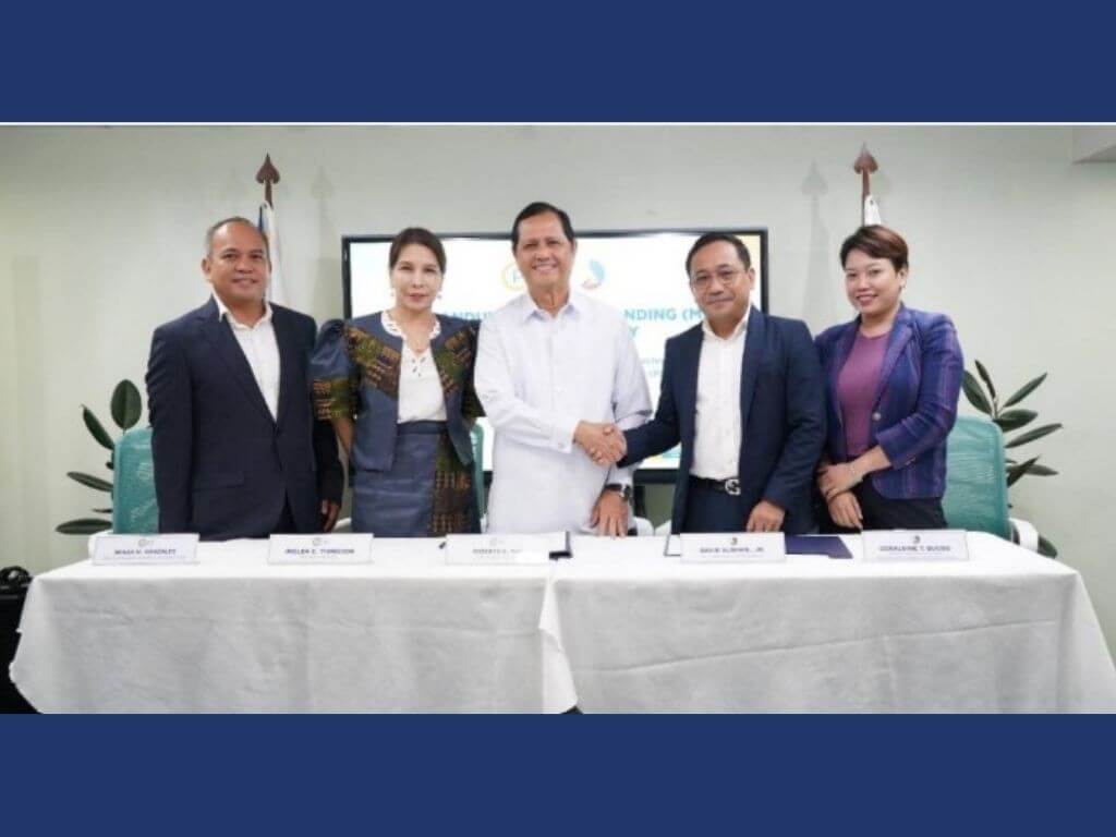 PDIC president and CEO Roberto B. Tan (center) and DICT Undersecretary for E-Government David L. Almirol, Jr. (second from right) sign the MOU. Witnessing the signing were PDIC vice president Renar M. Gonzales (information technology group) (leftmost), PDIC board director Imelda C. Tiongson, and DICT Director and Officer-in-Charge Geraldine T. Bucog (government digital transformation bureau).| Contributed photo