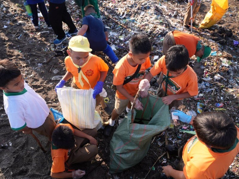 Small hands make a big impact as young volunteers help each other collect trash from Baseco Beach in Manila during the International Coastal Cleanup held on Sept. 19. | Contributed photo