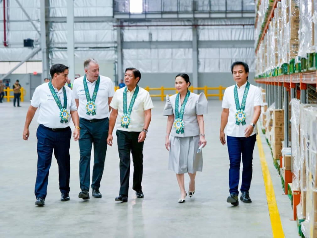 President Ferdinand R. Marcos Jr. and Trade and Industry Secretary Cristina A. Roque, accompanied by Maersk's officials, tour the company's new hub in Calamba, Laguna./ Photo from the Presidential Communications Office