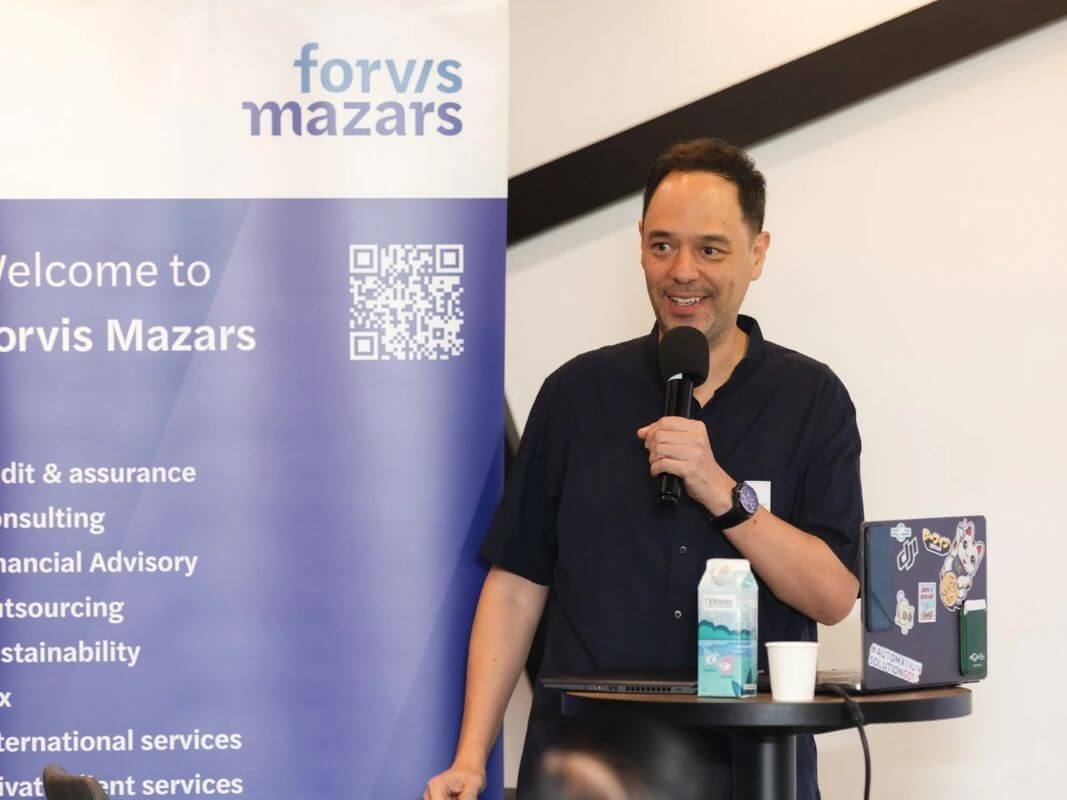 Keynote speaker Christoph Burgdorfer, managing director of Asteria, expounds on artificial intelligence and its transformative impact on work and industries./Contributed photo