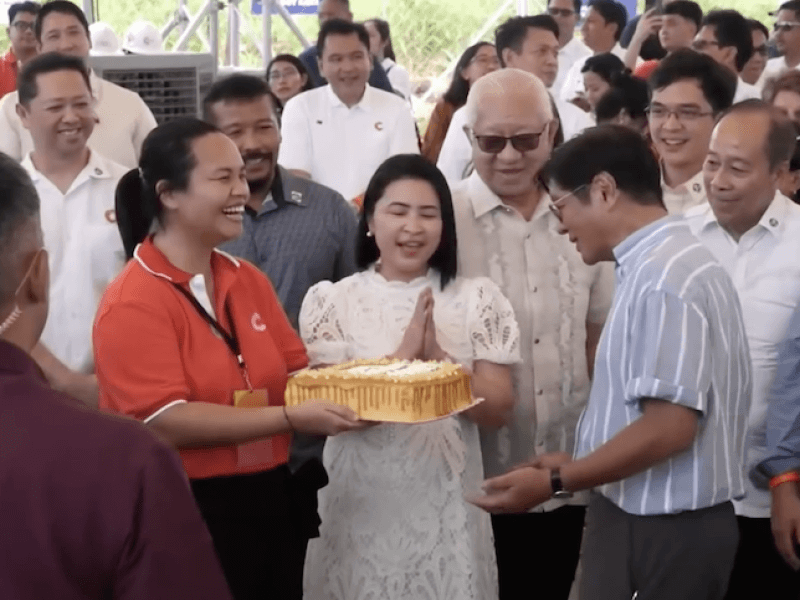 Citicore's Anna Salgado presents a birthday cake to President Marcos Jr., who celebrated his birthday on Sept. 13./Screenshot from RTVM 