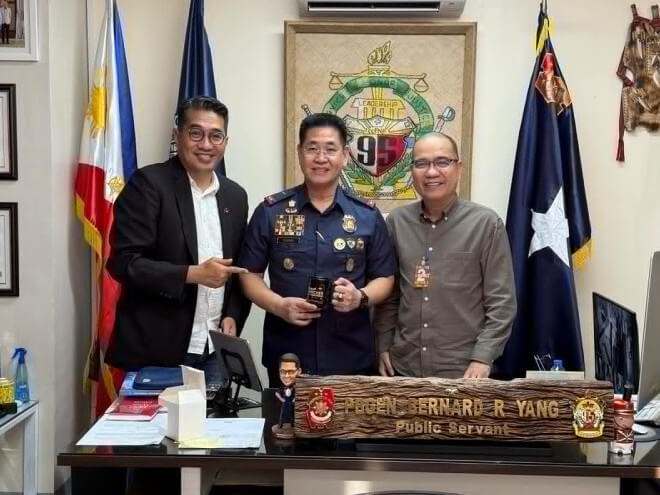 PNP-ACG Acting Director Brigadier General Bernard Yang (center) with Jocel de Guzman and Art Samaniego of Scam Watch Pilipinas./ Contributed photo