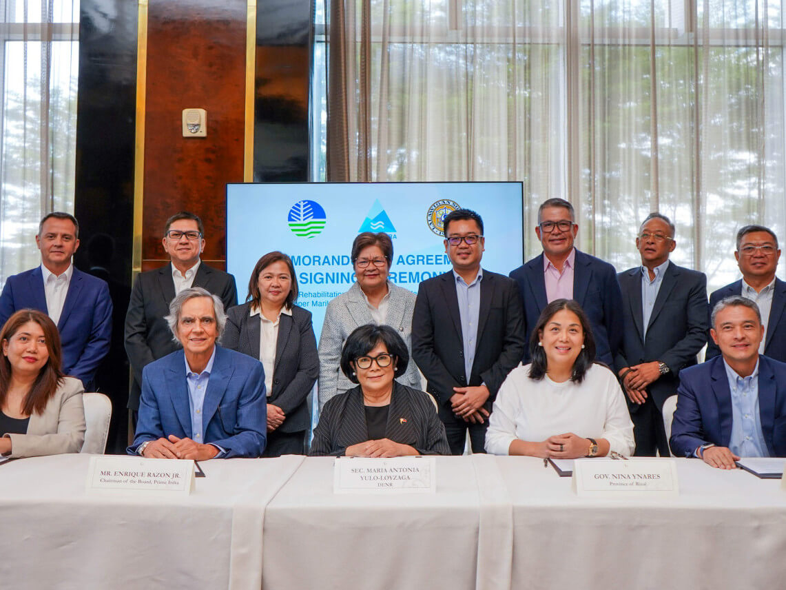 (Seated from L-R) Prime Infra chief administrative officer Minerva Matibag, chair Enrique Razon Jr., Environment Secretary Maria Antonia “Toni” Yulo Loyzaga, Rizal Governor Nina Ricci Yñares, and Environment Undersecretary Juan Miguel Cuna formalized the memorandum of agreement for the rehabilitation and sustainable management of the Upper Marikina River Basin Protected Landscape. With them (standing from L-R) were Prime Infra president and CEO Guillaume Lucci, and Environment Undersecretaries Ignatius Loyola Rodriguez, Analiza Rebuelta-Teh, and Marilou Erni, Rizal Provincial Legal Office head Orlando Paolo Casimiro, and Environment Undersecretaries Joselin Marcus Fragada, Ernesto Adobo Jr., and Augusto Dela Peña./ Contributed photo