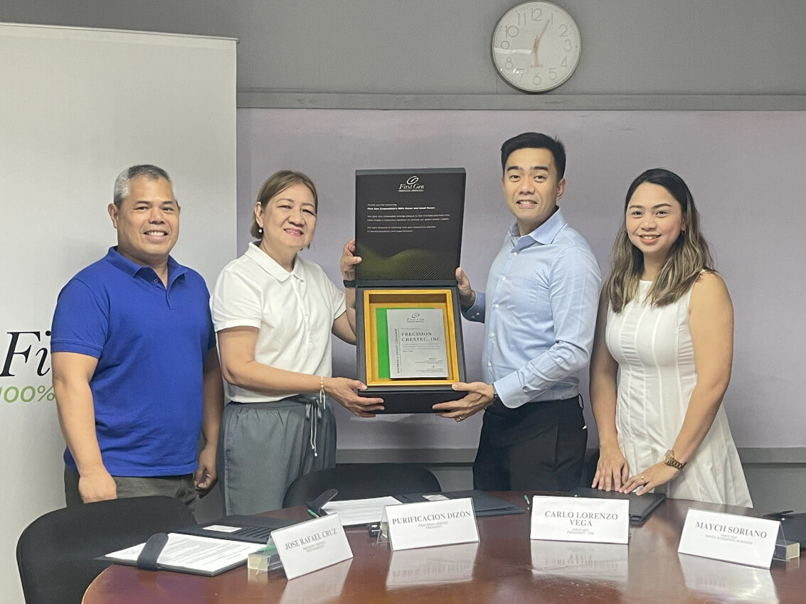 Precision Crestec president Purificacion Dizon (second from left) and First Gen VP and chiefcustomer engagement officer Carlo Lorenzo Vega (third from left) reaffirm the partnership between their companies by signing a new power supply contract on Jan. 20, 2025. With them are Jose Rafael Cruz of Precision Crestec and Maych Soriano of First Gen./Photo from First Gen