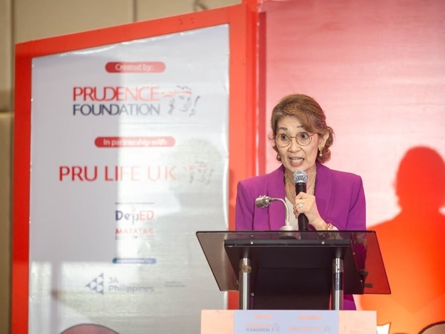 "Angelica Nenet Lavares, chair of Pru Life UK, speaks during an event celebrating the program's milestones." /Contributed photo