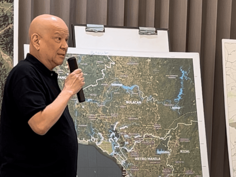 Ramon Ang presents a map of Bulacan&rsquo;s major river systems and catch basins as he addresses claims linking the new airport to flooding./Photo by Miguel R. Camus&nbsp;