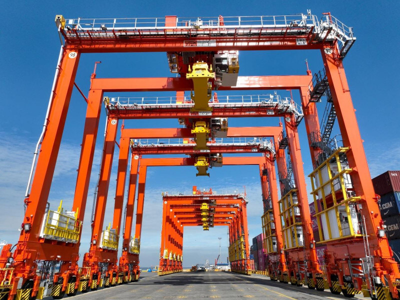 The new near-zero emission (NZE) rubber-tired gantries at the Manila International Container Terminal (MICT), the first of their kind in the Philippines./Photo from ICTSI 