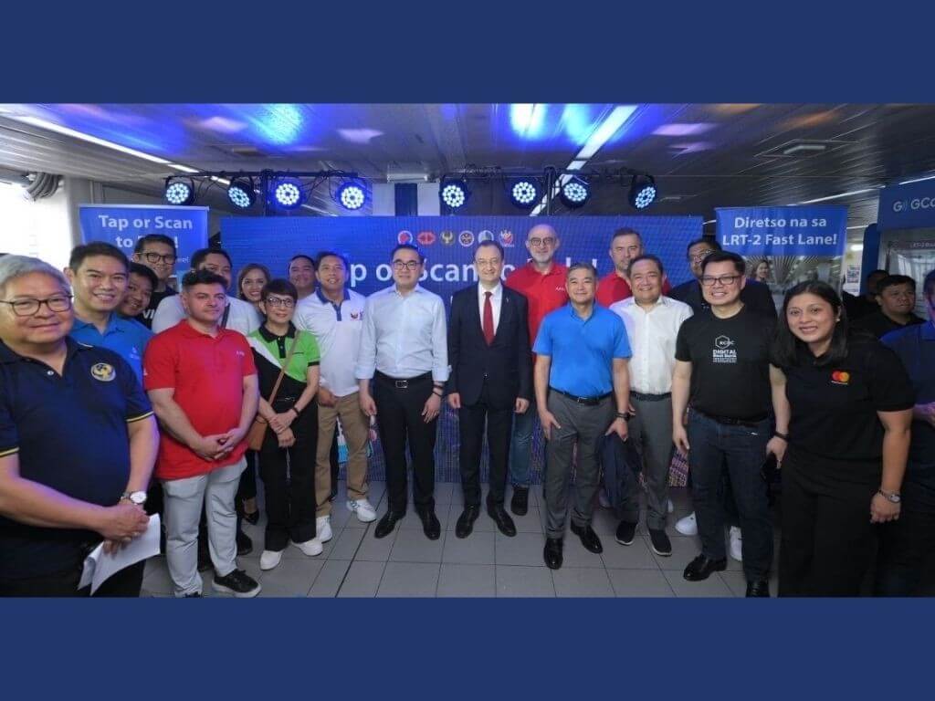 Officials from government agencies and industry partners come together to mark the launch of the pilot implementation of the Automated Fare Collection System for LRT-2, a collaborative initiative that advances seamless, interoperable, and cashless commuting for the riding public. | Contributed photo