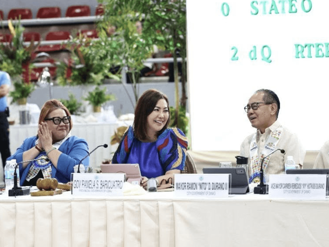 Cebu Gov. Pam Baricuatro presides over the full council meeting of the Regional Development Council in Central Visayas at the Danao City Civic Center in Danao City, &nbsp;Northern Cebu. With her are Jennifer Breta&ntilde;a, Department of Economy, &nbsp;Planning, and Development-Central Visayas(DEPDev-7) director &nbsp;who sits as RDC-7 vice chair; and Danao City Mayor Ramonito Durano III. | Photo from the Cebu province Facebook page
