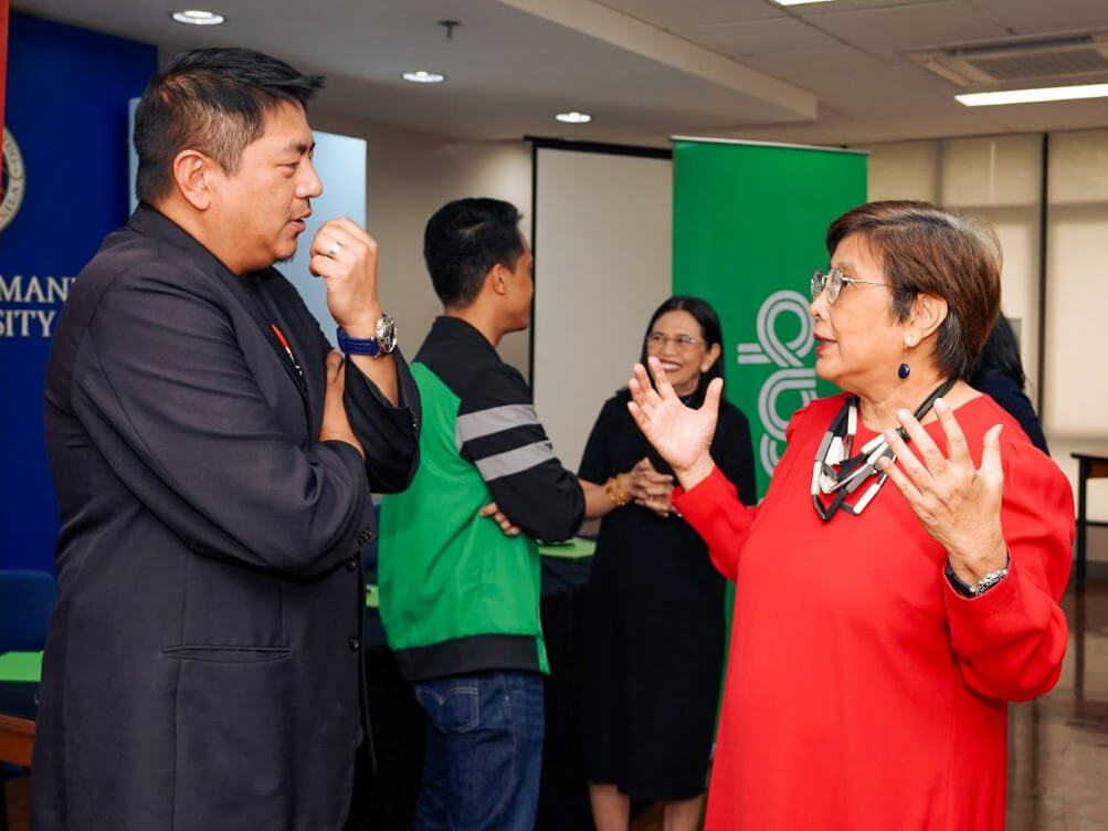 MOVE IT GM Wayne Jacinto and Ateneo's head research proponent Dr. Maria Isabel E. Melgar/ Contributed photo