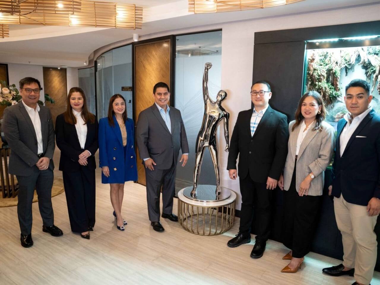 (From left) RLC Residences' sales group head Dominic Lagrosa, sales channel head Trish Lyttle - Mariano, vice president and overall Sales head Denise Lyttle-Lao, senior vice president and business unit general manager M. Teddy V. Bernas, Bahai Deals president & CEO Keny Chang, director of commercial operations Ana Alvarez, and sales director Kenneth Quezada| ​Contributed photo