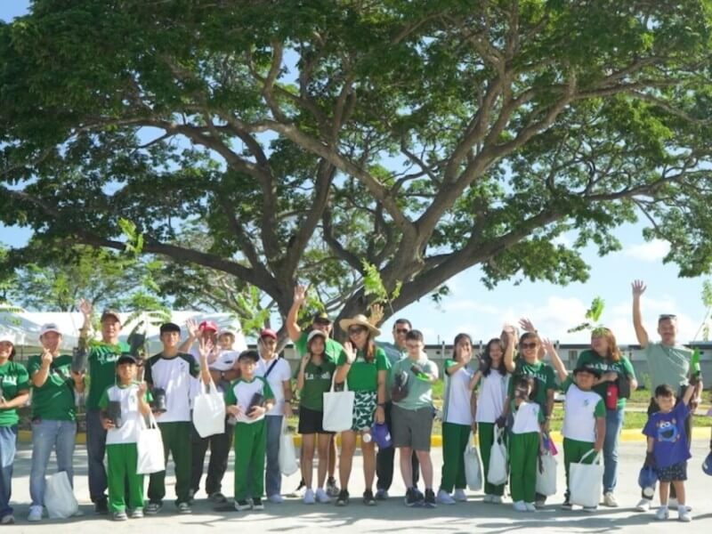 Members of PENCIL Inc., alongside RLC Residences executives Teddy V. Bernas (senior vice president and business unit general manager) and Dan Carlo Torres (Head ofMarketing) and their families, gather for a group photo during the Forbes Estates Lipa Tree Planting event.| Contributed photo