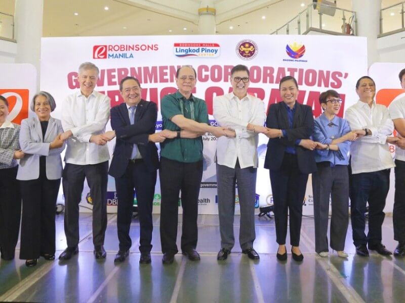 Finance secretary Ralph G. Recto and Robinsons Land Corp. president and CEO Mybelle V. Aragon-GoBio (8th and 9th from left), and top executives from participating GOCCs during the opening of the GOCC Caravan./Contributed photo (Click the photo to view full image)