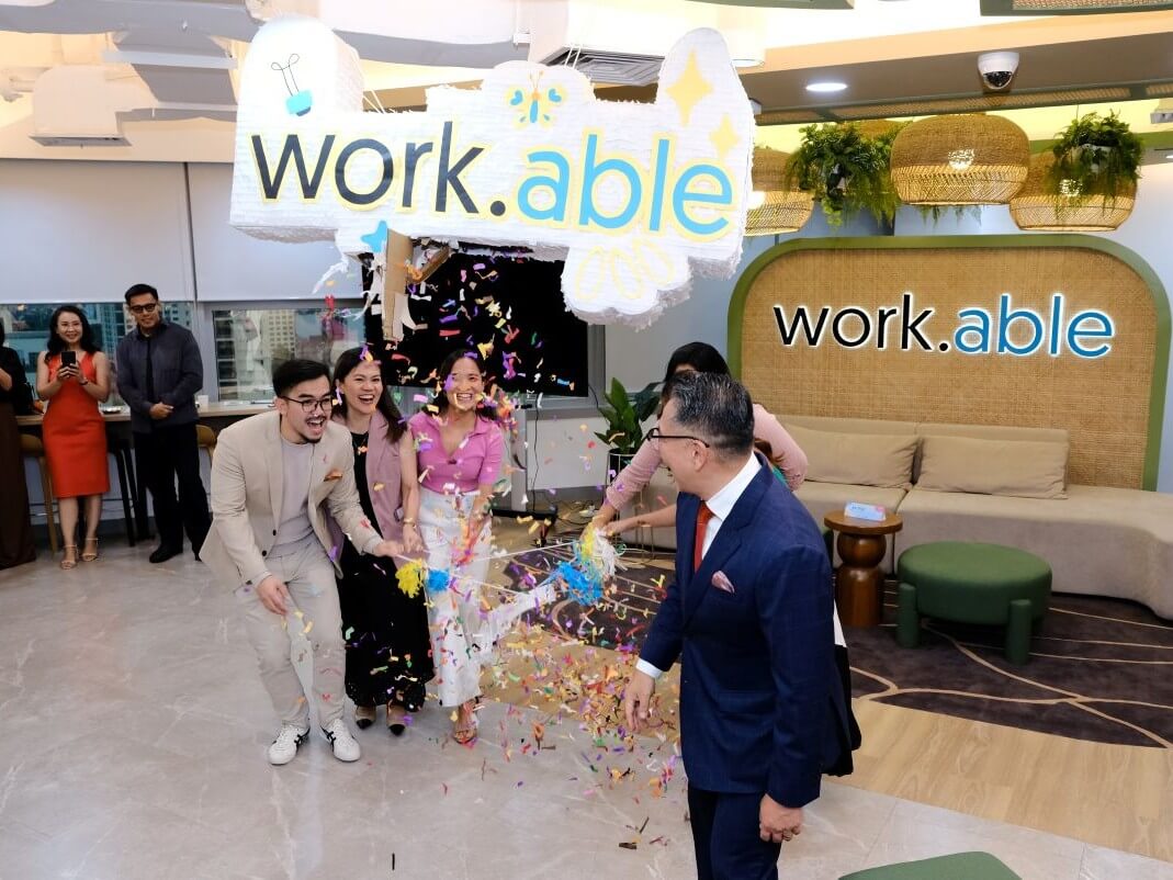 A bold twist on tradition, the ceremonial piñata pull marked the official launch of work.able RSC 3 & 4. (From left) John Peralta – head of work.able;  MA Buenaventura – leasing associate director; Jennylyn Llait – special projects senior manager; Stephanie Lopez – special projects manager, and Jericho P. Go– RL Commercial REIT Inc. president and CEO./ Photo from RLC