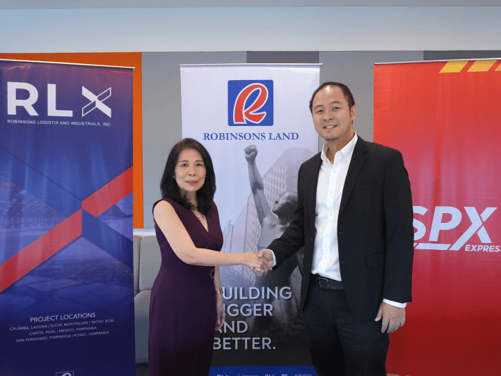 Cora Ang Ley, SVP and business unit GM &nbsp;of RLX and Martin N. Yu, head of SPX Philippines Inc., seal the agreement with a handshake. | Contributed photo
