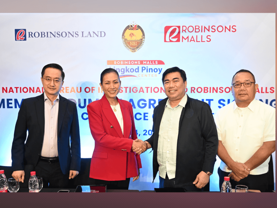 Officials from Robinsons Land Corp. and the National Bureau of Investigation (NBI) formalize their partnership at the signing of a Memorandum of Agreement. Shown (from left) are Robinsons Malls and Robinsons Destination Estates EVP and group business unit general manager Faraday D. Go; Robinsons Land Corp. president and CEO Mybelle V. Aragon-GoBio; NBI Director Atty. Melvin Matibag; and NBI Deputy Director for administration Atty. Jose Justo Yap.| Contributed photo