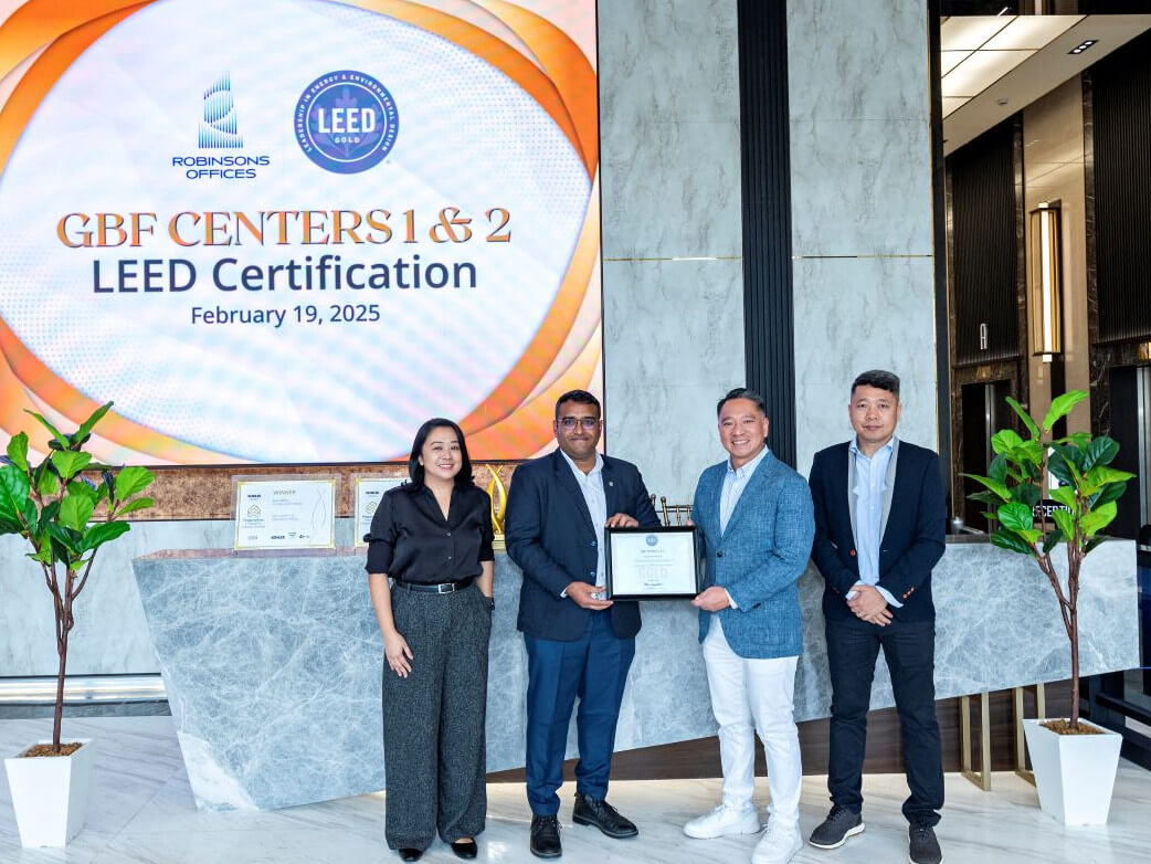 Robinsons Offices SVP and Business Unit GM Jericho P. Go (third from left) receives the LEED Gold certification for GBF Centers 1 & 2 from (L-R) Katherine Resurreccion – associate director, Arcadis Philippines and Rohith Ravula – associate director, Green Business Certification Inc. With them is  Solomon Puro II – head of project management, Robinsons Offices./ Contributed photo