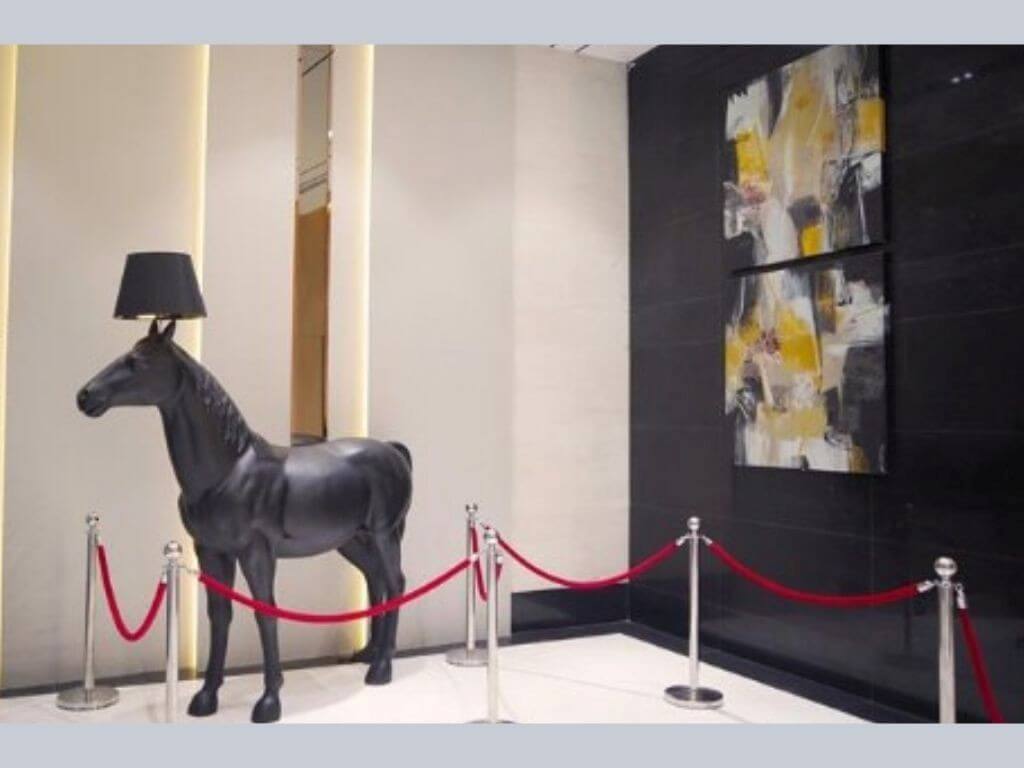 A sculptural horse-shaped lamp and curated Artablado pieces add character and refinement to the reimagined Cyberscape Alpha lobby, blending art, design, and workplace elegance. | Contributed photo