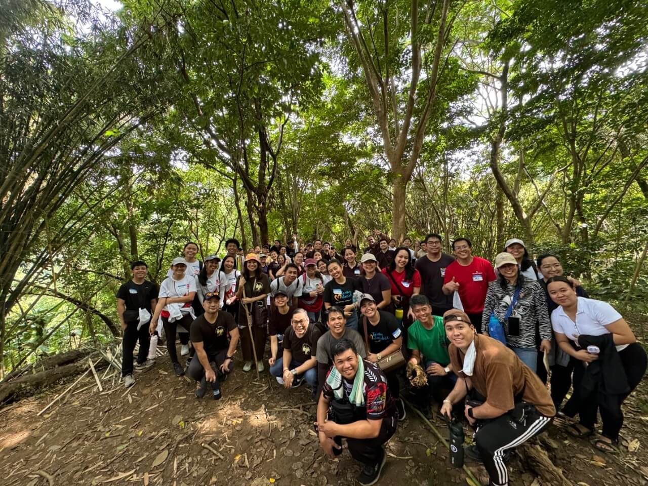 San Miguel Corporation’s Team Malasakit volunteers trek to Mount Purro in Antipolo City on Saturday, June 21, to plant at least 2,000 seedlings of native tree species./Contributed photo
