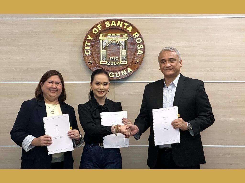Mayi Rodriguez, vice president and regional estates project development group head; Santa Rosa City, Laguna Mayor Arlene Arcillas; Chris Maglanoc, senior vice president and regional estates group head. | Contributed photo