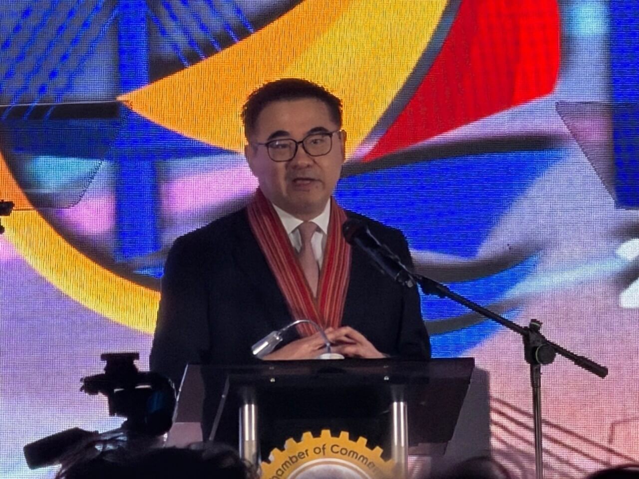 Finance Secretary Frederick Go corrects the fake news being circulated about Pax Silica, the US-led technological alliance during his keynote address at the Business Summit organized by the Mandaue Chamber of Commerce and Industry. He also highlighted the policies laid out by the administration to help boost the economy.| Photo by Connie Fernandez-Brojan