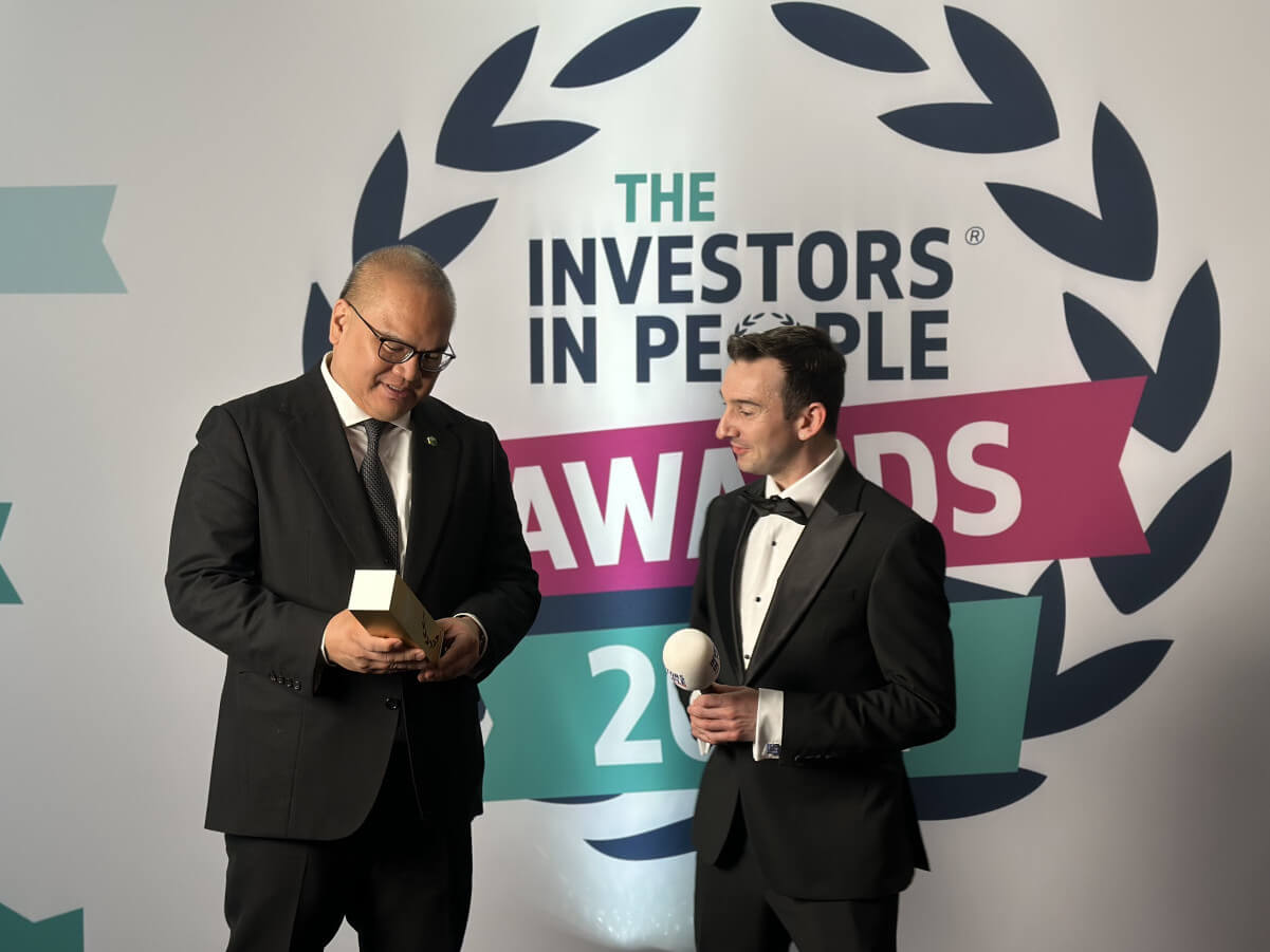 SEC Commissioner Javey Paul D. Francisco receives the award for Overseas Employer of the Year during the Investors in People Awards 2024 held in London, United Kingdom on Nov. 13./ Contributed photo