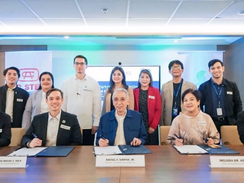 Security Bank Foundation and A.C. Steel executives formalize their Build a School, Build a Nation partnership in Makati City. Leading the ceremony, seated from left, are Richard Uy, COO, AC Steel Industries Inc.; Enrique Dominic Miguel C. Sola, CEO, AC Steel Industries Inc.; Rafael Simpao Jr., chair, Security Bank Foundation; Melissa Aquino, trustee, Security Bank Foundation; and Louie De Real, executive director, Security Bank Foundation. | Contributed photo (Click to view full image)
