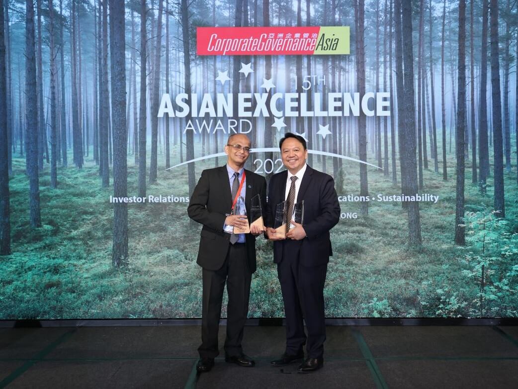 Security Bank FVP and Investor Relations Head Ropi Dangazo received the bank’s six trophies during the 15th Asian Excellence Awards in Hong Kong on June 27, 2025. Pictured with Dangazo is Aldrin Monsod, publisher and managing director of Environmental, Social and Corporate Governance Asia./ Photo from Security Bank