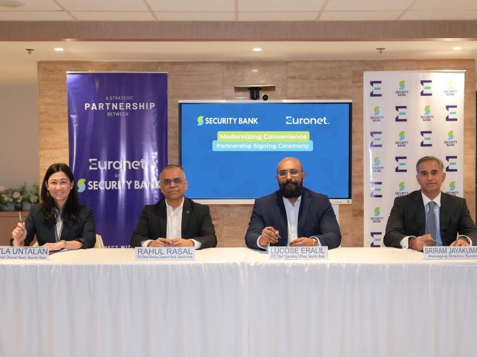 Security Bank SVP and retail channels head Myla Untalan, EVP and retail banking segment head Rahul Rasal, EVP and COO Lucose Eralil with Euronet managing director Sriram Jayakumar./ Contributed photo