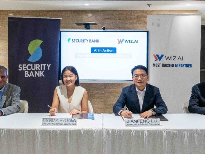  From Balaji Vijayan, Security Bank SVP and retail and business banking risk management head; Luz Pilar De Guzman, Security Bank EVP and chief risk officer; Jiangfeng Lu, WIZ.AI chair; and Alex Song, WIZ.AI chief revenue officer. | Contributed photo  (Click to view full image)