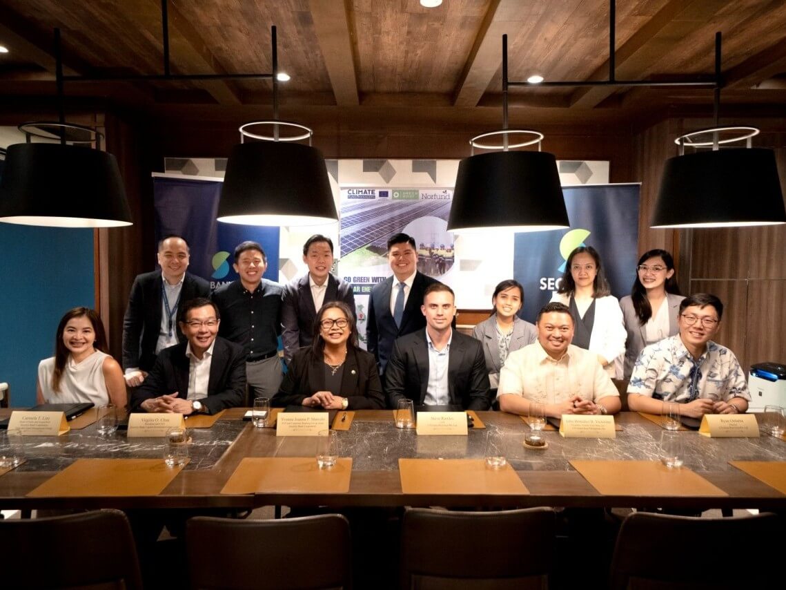 Seated (from left): Security Bank sales and acquisition head Marie Carmela Lim; Security Bank Capital and Investment Corp. president and CEO Virgilio Chua; Security Bank corporate banking group head Yvonne Joanna Marcelo; CN Green Roof Asia CEO Steve Rawles; Climate Fund Managers senior investment manager John Benedict Victorino; and Climate Fund Managers investment manager Ryan Oetama. Standing (L-R): Security Bank Capital and Investment Corp. coverage and origination team head Marvin Matias; Security Bank other fiduciary services department head Josh Carlo Samson; CN Green Roof Philippines investment consultant Westin Raymond Contreras; Security Bank corporate banking team head Michael Patrick Cruz; CN Green Roof Philippines finance manager Mary Joy Flores; CN Green Roof Philippines legal consultant Donna Talledo; and Security Bank corporate banking junior relationship manager Emylou Jane Juanillo. | Contributed photo