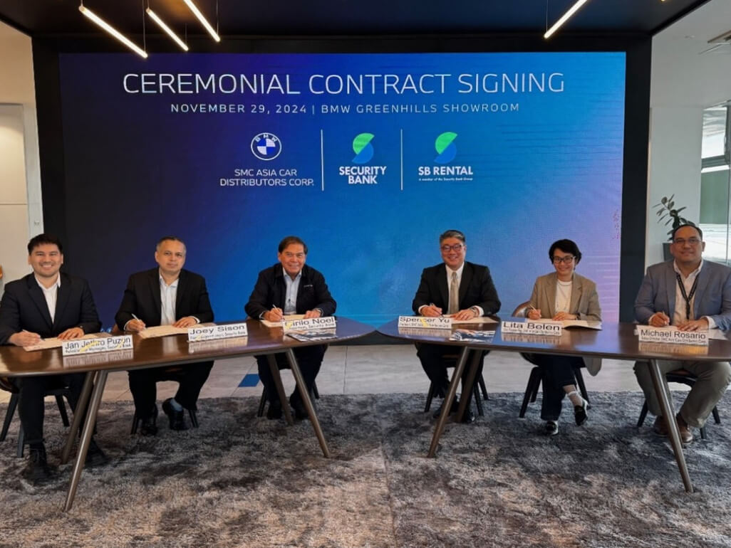 Security Bank's Jan Jethro Puzon, AVP, relationship manager; Joseph Cecilio Sison, FVP, focus segment head, and Cirilo Noel, chair;, with SMC Asia Car Distributors Corp.'s Spencer Yu, president; Lita Belen, group finance manager, and Michael Rosario, sales director./ Contributed photo