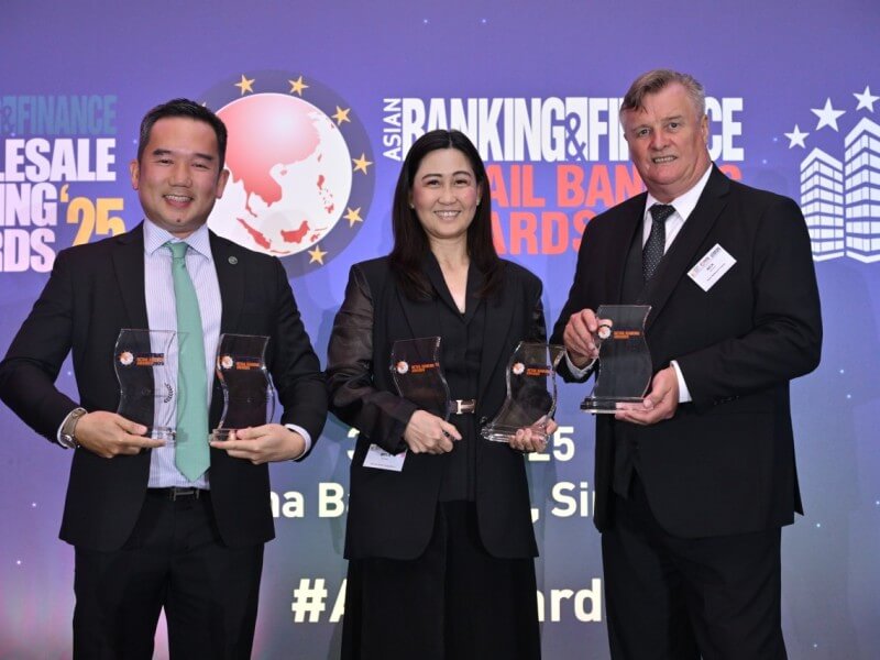 Security Bank won 10 awards at the Asian Banking & Finance Awards in Singapore on July 3, 2025. Bank executives John David Yap, EVP and business banking segment head and Myla Untalan, SVP and retail channels head, with contributing editor of Asian Banking & Finance Magazine Nick Atkinson./ Contributed photo