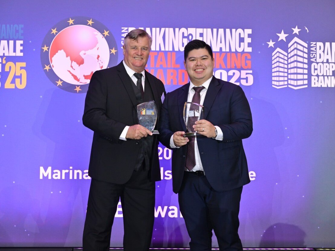 Security Bank’s Michael Patrick Cruz, SAVP and team head, corporate banking group (right), accepted the bank’s trophies at the Wholesale Banking Awards. With him is Nick Atkinson, contributing editor of Asian Banking & Finance Magazine./ Contributed photo