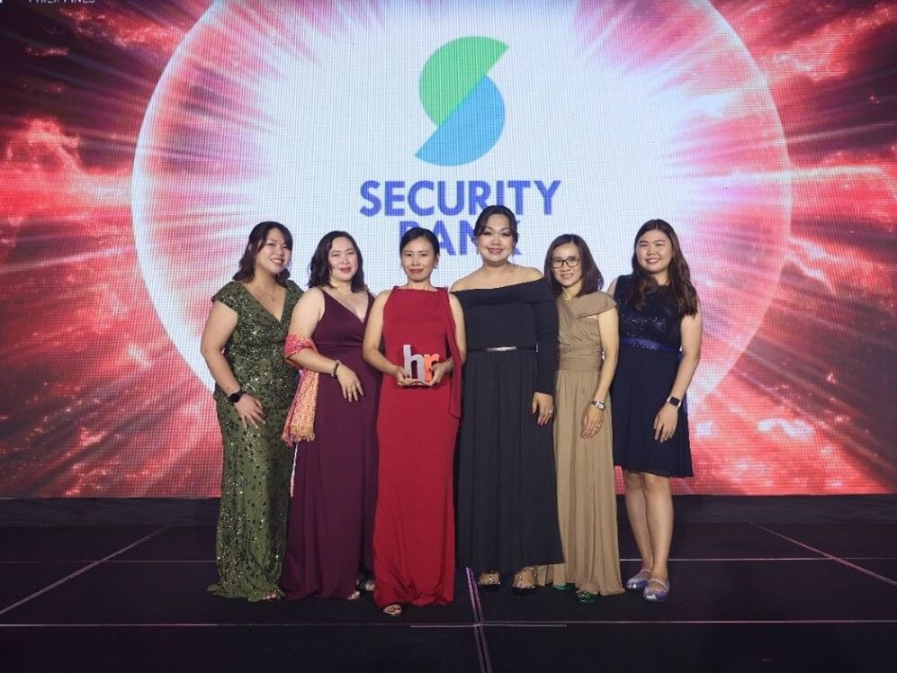 Security Bank’s HCM team at the HR Excellence Awards on Aug. 7, 2025. From left: Megan Fuentes, SM and wellness head; Karen Santos, wellness programs officer; Melissa Dayson, wellness programs officer; Karen Pasco, VP and employee relations, wellness & experience head, and Cy Jarin, wellness programs officer. | Contributed photo