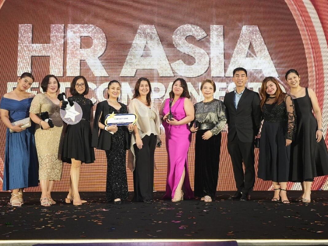 Security Bank’s HCM team accepted the Best Companies to Work for in Asia award from HR Asia. (From left) Yanna Lopez, HR business advisor; Karen Santos, wellness programs officer; Karen Pasco, VP and employee relations, wellness & experience head; Loraine Monares, SAVP and talent capability lead; Nerissa Berba, EVP and chief people officer; Megan Fuentes, SM and wellness head; Tetel Fernandez, FVP and talent management head; John Christopher Laset, SAVP and deputy head; Kat Villegas, HR business advisor; and Aina Quiambao, HR business partner.| Contributed photo