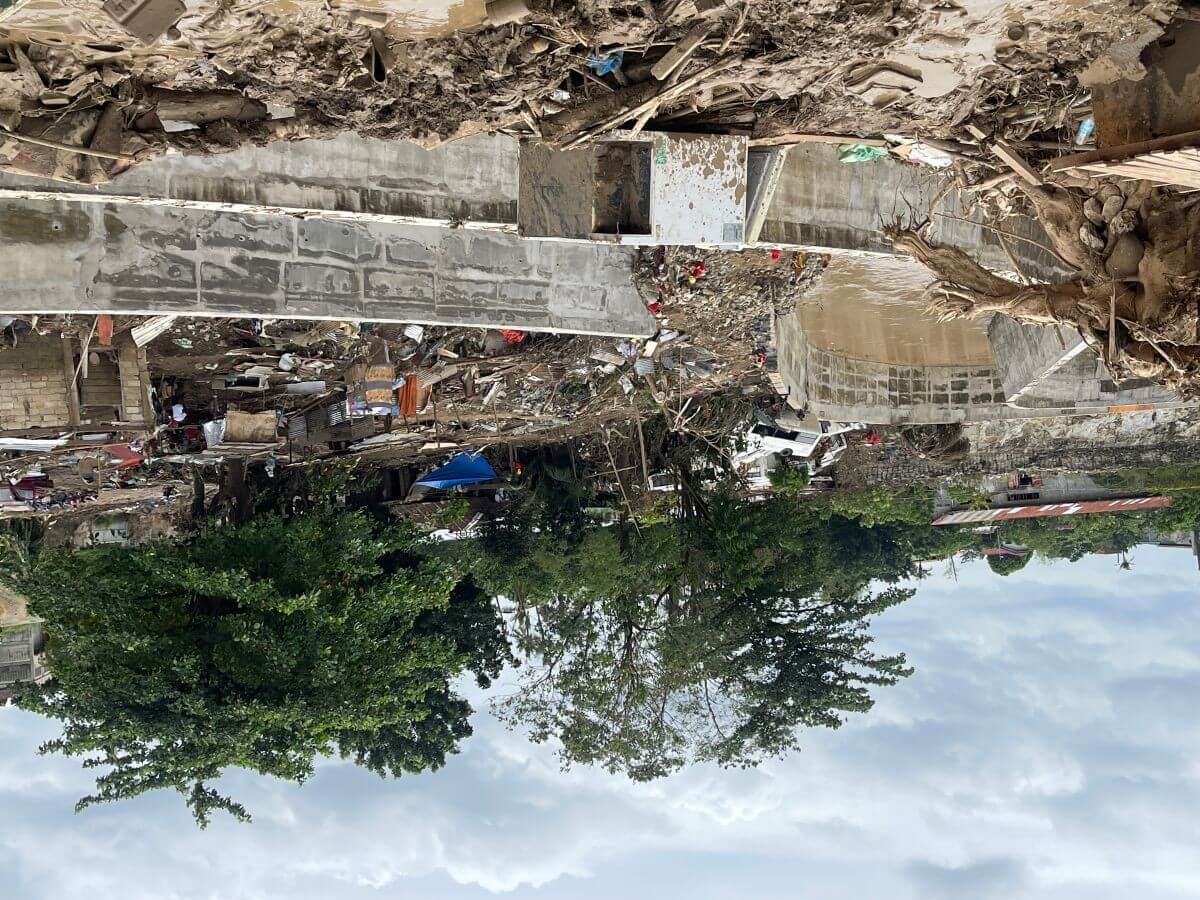 The dike built along the river in Barangay Casuntingan, Mandaue City gave way during the onslaught of typhoon “Tino.” | Photo by Connie Fernandez-Brojan