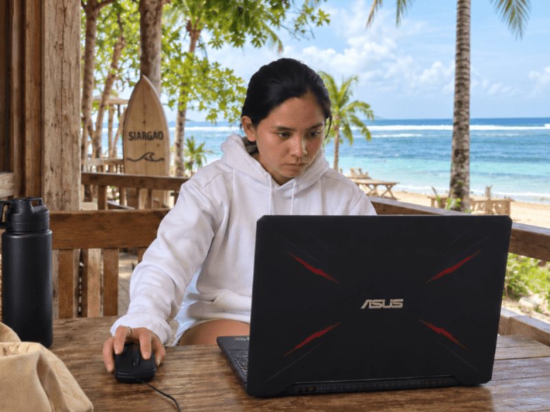 Elevate AIDA graduate Kimberly Arevalo is turning digital skills into career opportunities from home in Siargao, including an upcoming project with Connected Women, while helping care for her family. | Contributed photo