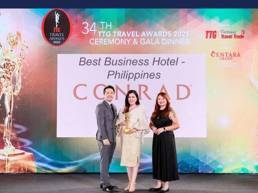 Joanne Gomez, Conrad Manila’s commercial director receives the “Best Business Hotel-Philippines” award at the TTG Travel Awards night in Bangkok, Thailand. | Contributed photo