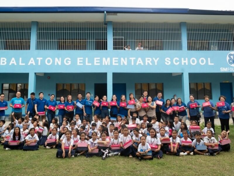 Students of Balatong Elementary School received their new shoes form the Shop & Share program./ Contributed photo (Click the photo to view full image)